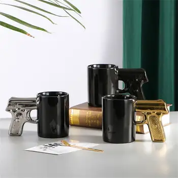 Loominguline Keraamiline Tass Kuld Ja Hõbe Püstol Cup Relva Käepide Kruus Touch Temperatuuri Ja Mugav Coffee Cup 3D Hallituse Glasuur